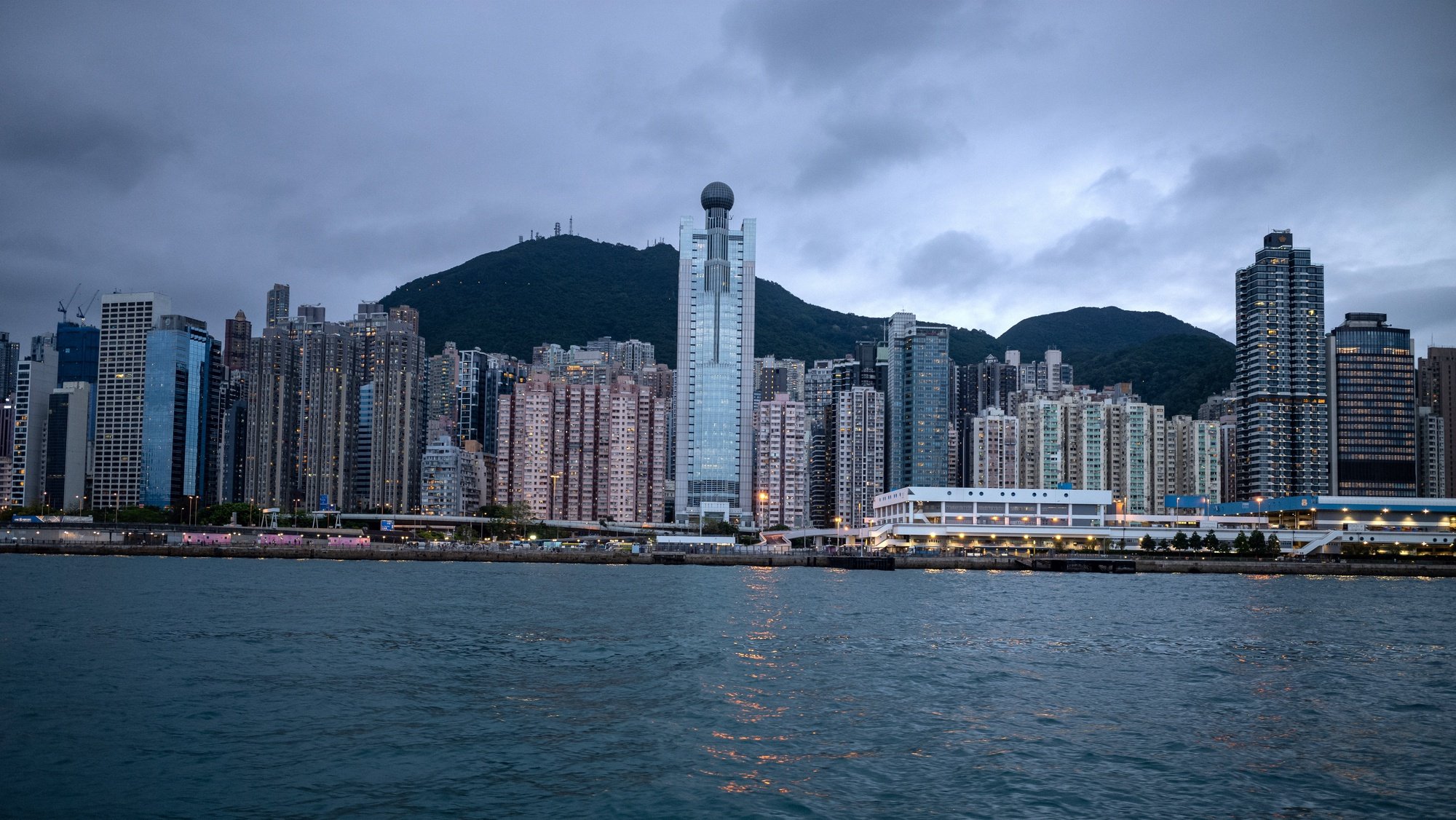 epa09922483 Residential and commercial buildings stand on Hong Kong Island in Hong Kong, China, 02 May 2022. For the first time in almost three months Hong Kong&#039;s daily caseload has fallen below the 300 mark.  EPA/JEROME FAVRE