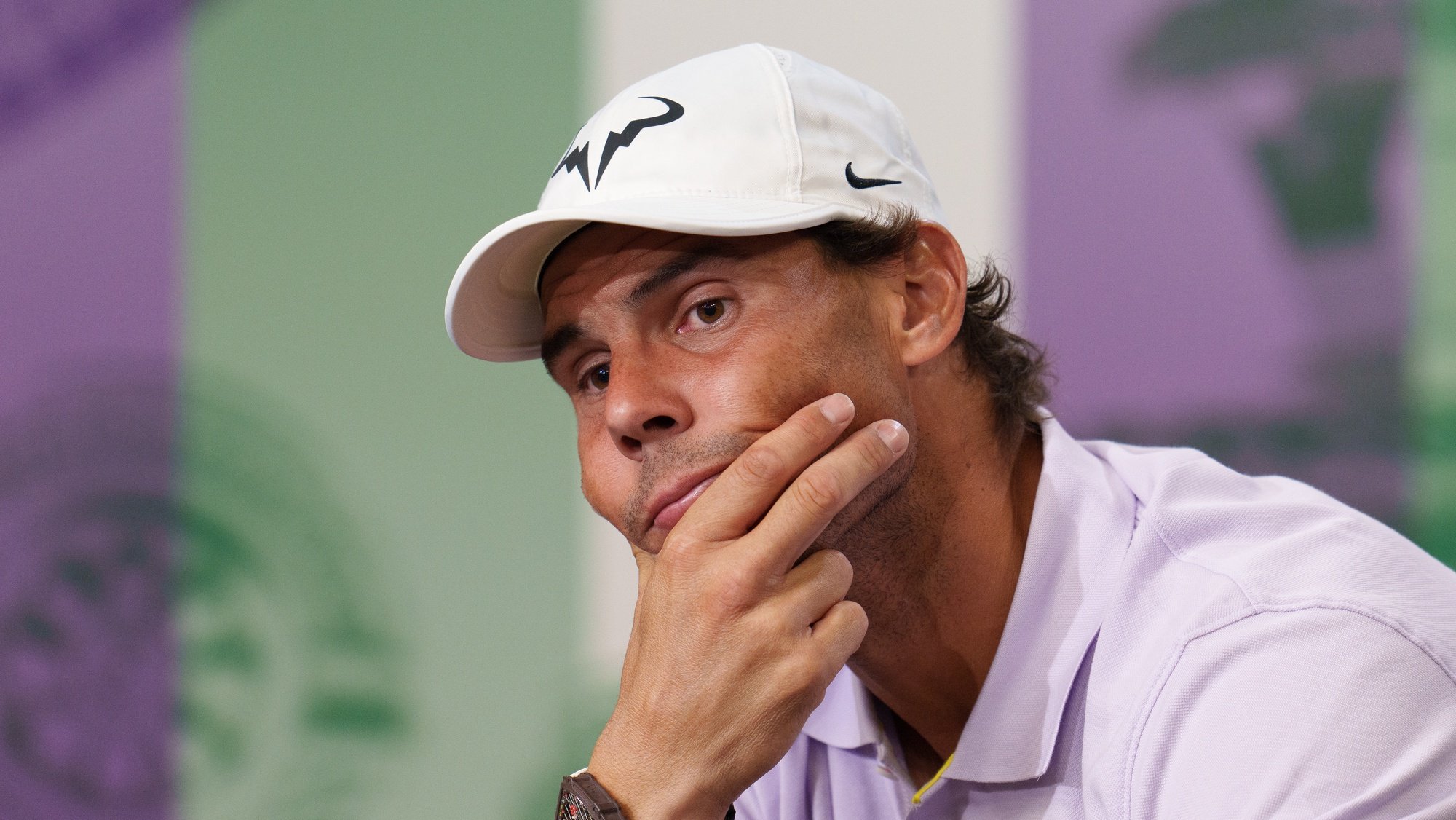 epa10057655 A handout photo made available by AELTC of Rafael Nadal of Spain (R) during a press conference as he announces that he is withdrawing from the men&#039;s singles semi final at the Wimbledon Championships 2022, Wimbledon, Britain, 07 July 2022.  EPA/JOE TOTH  / AELTC HANDOUT  HANDOUT EDITORIAL USE ONLY/NO SALES HANDOUT EDITORIAL USE ONLY/NO SALES