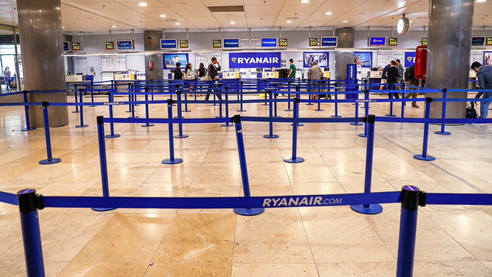 epa07852821 A view on Ryanair check-in counters at Adolfo Suarez Airport in Barajas, Madrid, Spain, 19 September 2019. According to reports, Ryanair cabin crew members are on strike on 19,20 and 22September in a protest against the planned closure of four of the airline bases in Spain: Tenerife Sur, Lanzarote, Gran Canaria and Girona on 08 January 2020.  EPA/EMILIO NARANJO