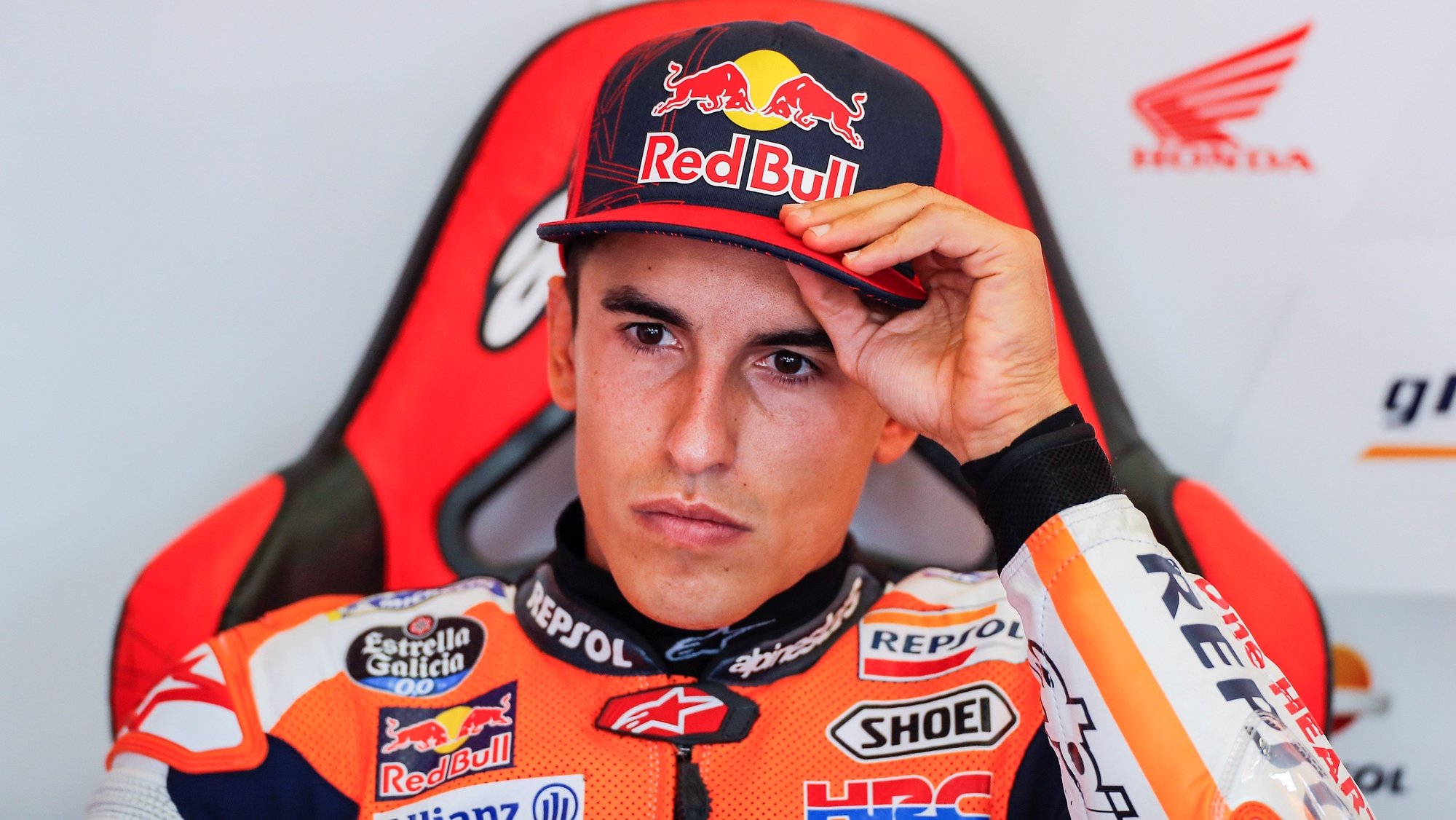 epa08565347 Spanish MotoGP rider Marc Marquez of Repsol Honda team rests in his garage before he takes part in a free training session at Circuito de Jerez-Angel Nieto circuit, in Jerez, southern Spain, 25 July 2020. The Red Bull Andalusia GP race will be held on 26 July behind closed doors due to COVID-19 pandemic.  EPA/ROMAN RIOS