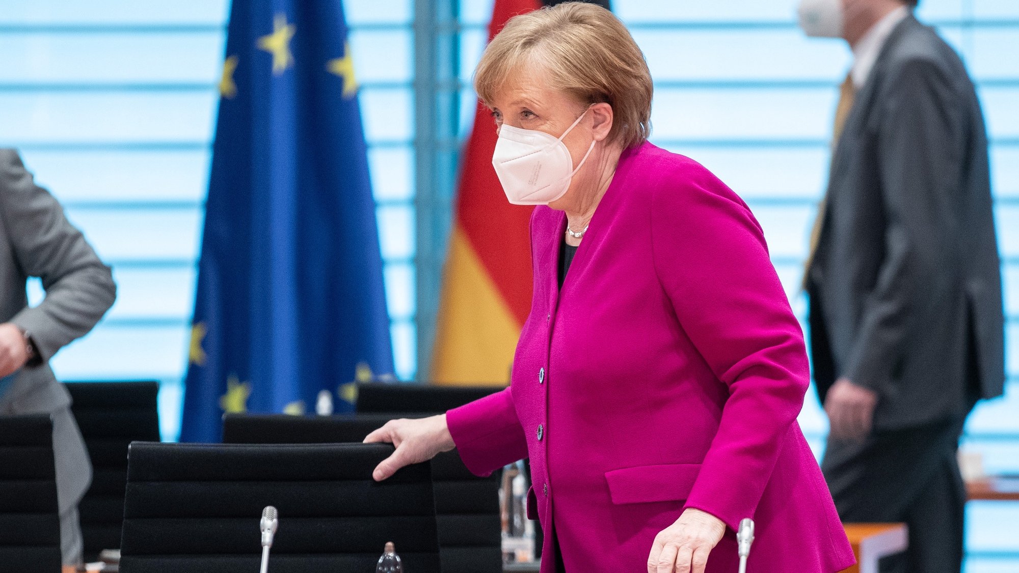 epa09108011 German Chancellor Angela Merkel wearing a face mask attends a cabinet meeting in Berlin, Germany, 31 March 2021.  EPA/ANDREAS GORA / POOL