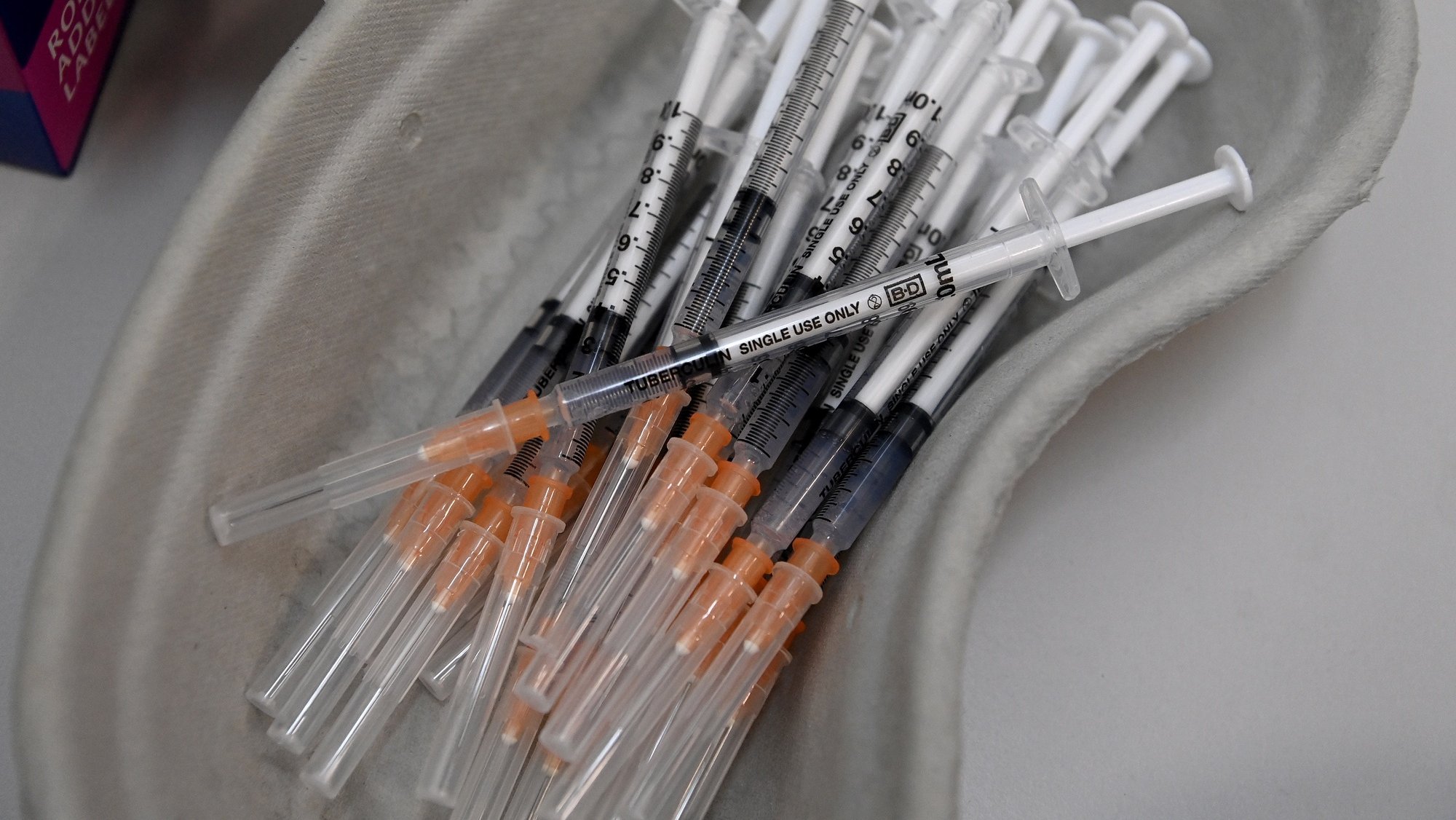 epa09433159 Syringes filled with Pfizer COVID-19 vaccine at the Belmore Medical GP in the suburb of Belmore, Australia, 28 August 2021. Dr Jamal Rifi from Belmore Medical GP will be providing second doses to people who paid for their Pfizer vaccine at a GP clinic in Campsie.  EPA/BIANCA DE MARCHI AUSTRALIA AND NEW ZEALAND OUT