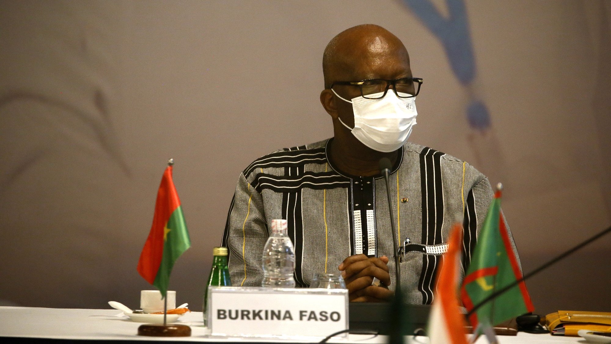 epa09346993 Burkinabe President Roch Marc Christian Kabore attends the summit of the International Development Association (IDA) in Abidjan, Ivory Coast, 15 July 2021. The event is attended by several African heads of state.  EPA/LEGNAN KOULA