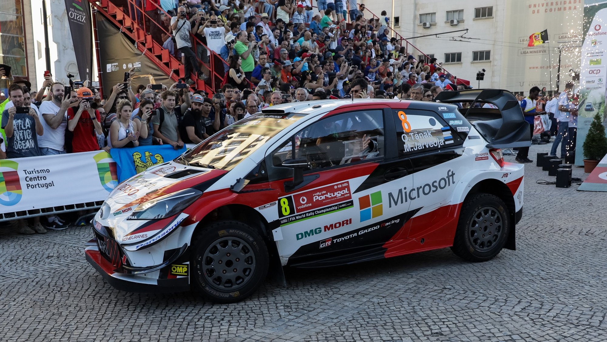 epa07613468 Ott Tanak of Estonia drives his Toyota Yaris WRC during the ceremonial start on the first day of the Rally de Portugal as part of the World Rally Championship (WRC) in Coimbra, centre of Portugal, 30 May 2019.  EPA/PAULO NOVAIS