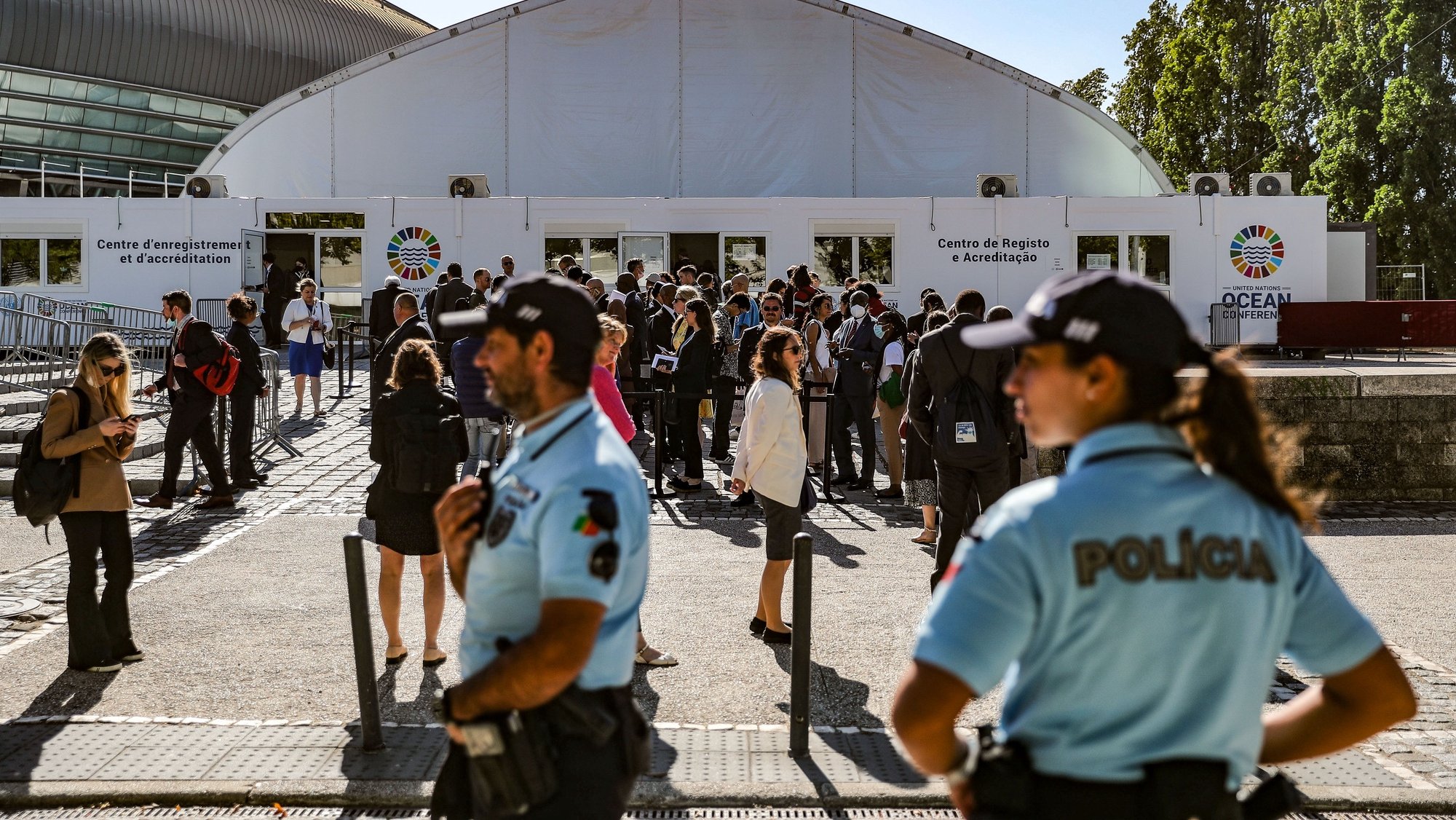 Police and media representatives outside the UN Ocean Conference venue, Altice Arena at Lisbon, 27th June 2022. MIGUEL A. LOPES/LUSA