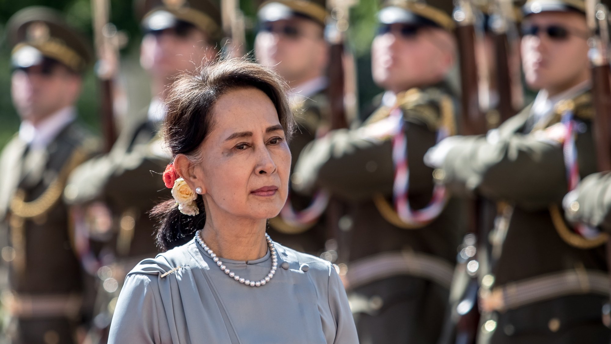 epa09676614 (FILE) - Myanmar&#039;s State Counselor Aung San Suu Kyi inspects a guard of honor during a welcome ceremony in Prague, Czech Republic, 03 June 2019 (reissued 10 January 2022).  Myanmar’s ousted civilian leader Aung San Suu Kyi has been convicted of three criminal charges and sentenced to four years in prison in the second round of verdicts handed out by a court on 10 January 2022.  EPA/MARTIN DIVISEK