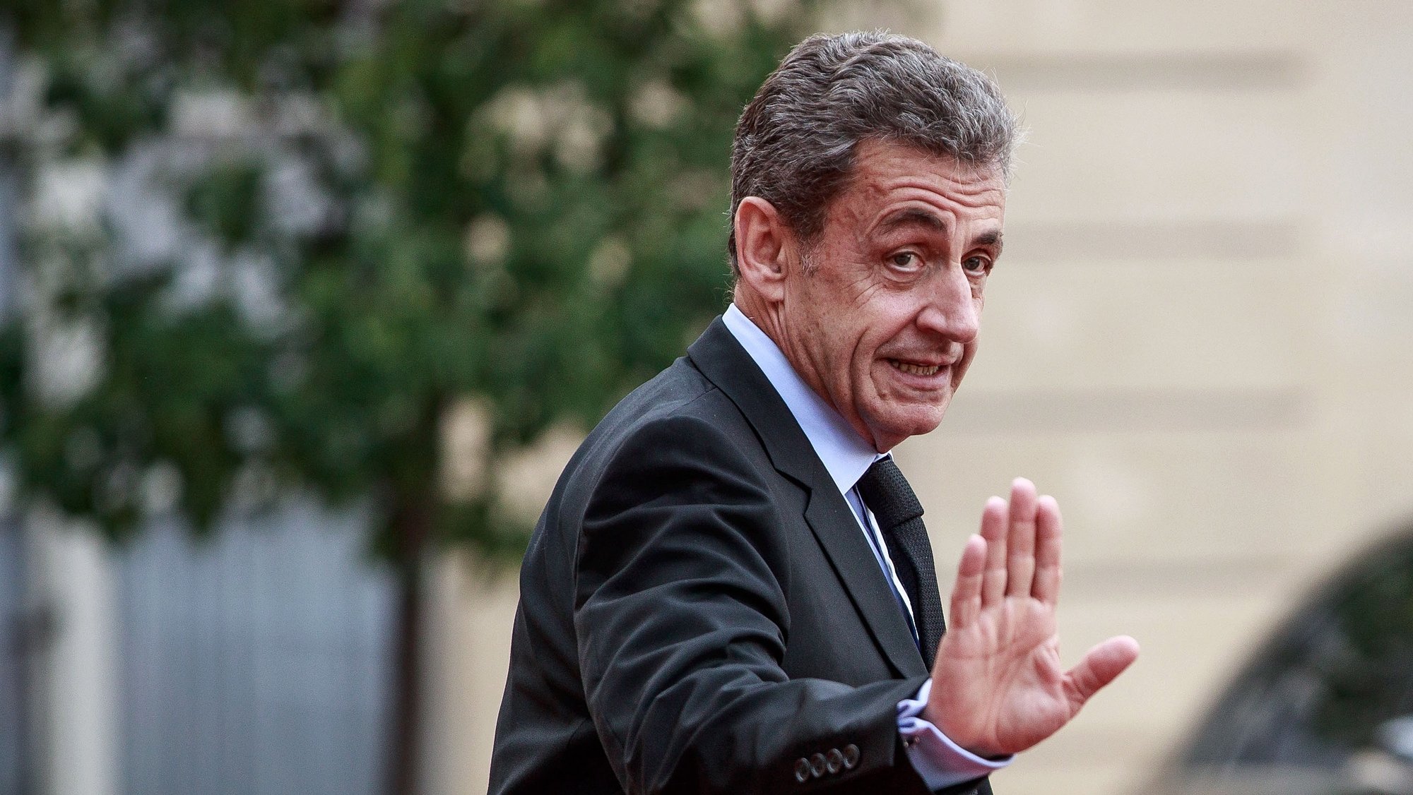 epa09496927 (FILE) - Former French president Nicolas Sarkozy leaves the Elysee palace after a lunch for the visiting leaders and heads of state, following a memorial for French former President Jacques Chirac, in Paris, France, 30 September 2019 (reissued 30 September 2021). A Paris court announced on 30 September 2021, it has found France&#039;s former president Nicolas Sarkozy guilty of illegal campaign financing of his unsuccessful 2012 reelection bid. He was not present for the verdict&#039;s announcement at the court. The ruling came six months after Sarkozy was handed a one-year prison sentence for corruption in a separate trial.  EPA/CHRISTOPHE PETIT TESSON *** Local Caption *** 56731802