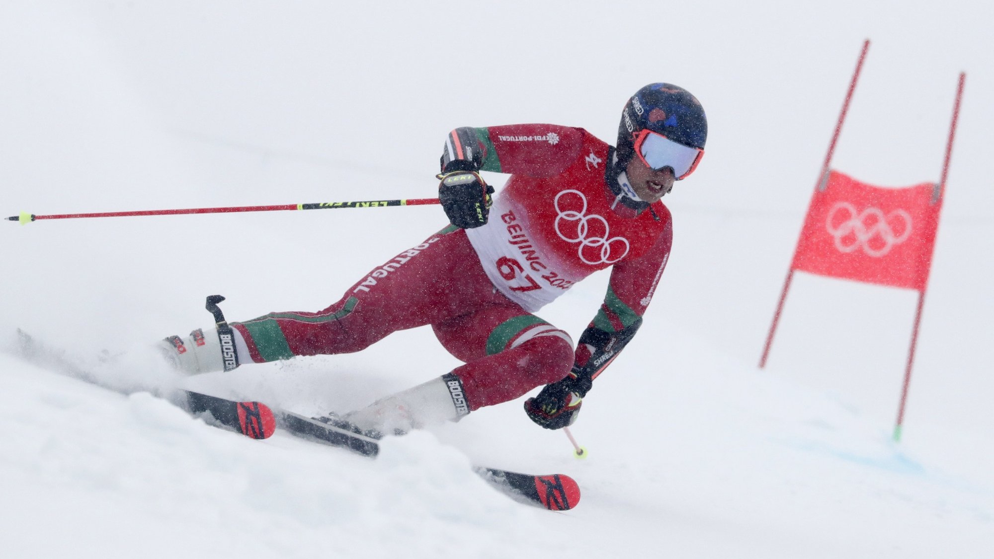 epa09751417 Ricardo Brancal of Portugal during the first run of the Men&#039;s Giant Slalom race of the Alpine Skiing events of the Beijing 2022 Olympic Games at the Yanqing National Alpine Ski Centre Skiing, Beijing municipality, China, 13 February 2022.  EPA/GUILLAUME HORCAJUELO