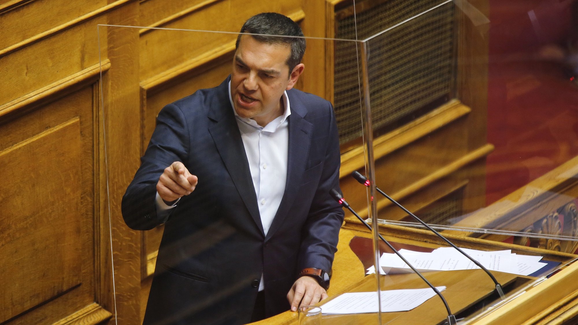epa09718672 Greek main opposition SYRIZA - Progressive Alliance leader Alexis Tsipras delivers a speech during a debate on a motion of censure against the government at the Greek Parliament, in Athens, Greece, 30 January 2022. The censure motion was introduced by Tsipras, who said that a series of crises like the pandemic, price hikes, and snowstorm management &#039;prove that Prime Minister Kyriakos Mitsotakis and his government are ineffective and dangerous for the country.&#039;  EPA/ALEXANDROS VLACHOS