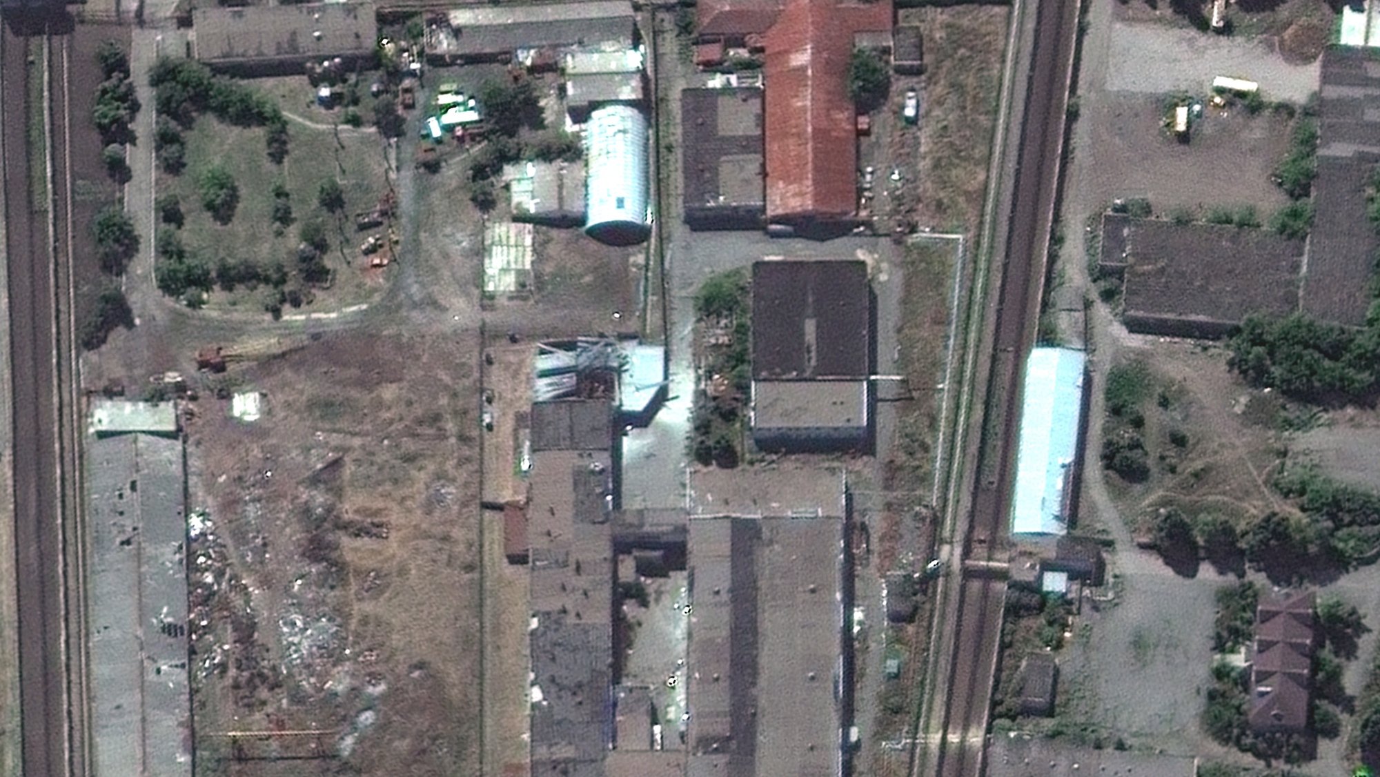epa10099593 A handout satellite image made available by Maxar Technologies shows the Olenivka prison in the Donetsk region of Ukraine where more than 50 people reportedly died following an attack and explosion at the prison early on 29 July (issued 31 July 2022). Russian officials said that 53 Ukrainian POWs were killed in the attack on the compound located in the DPR-controlled region, for which both Ukraine and Russia blame each other. Russian troops on 24 February entered Ukrainian territory, starting a conflict that has provoked destruction and a humanitarian crisis.  EPA/MAXAR TECHNOLOGIES HANDOUT -- MANDATORY CREDIT: SATELLITE IMAGE 2022 MAXAR TECHNOLOGIES -- THE WATERMARK MAY NOT BE REMOVED/CROPPED -- HANDOUT EDITORIAL USE ONLY/NO SALES
