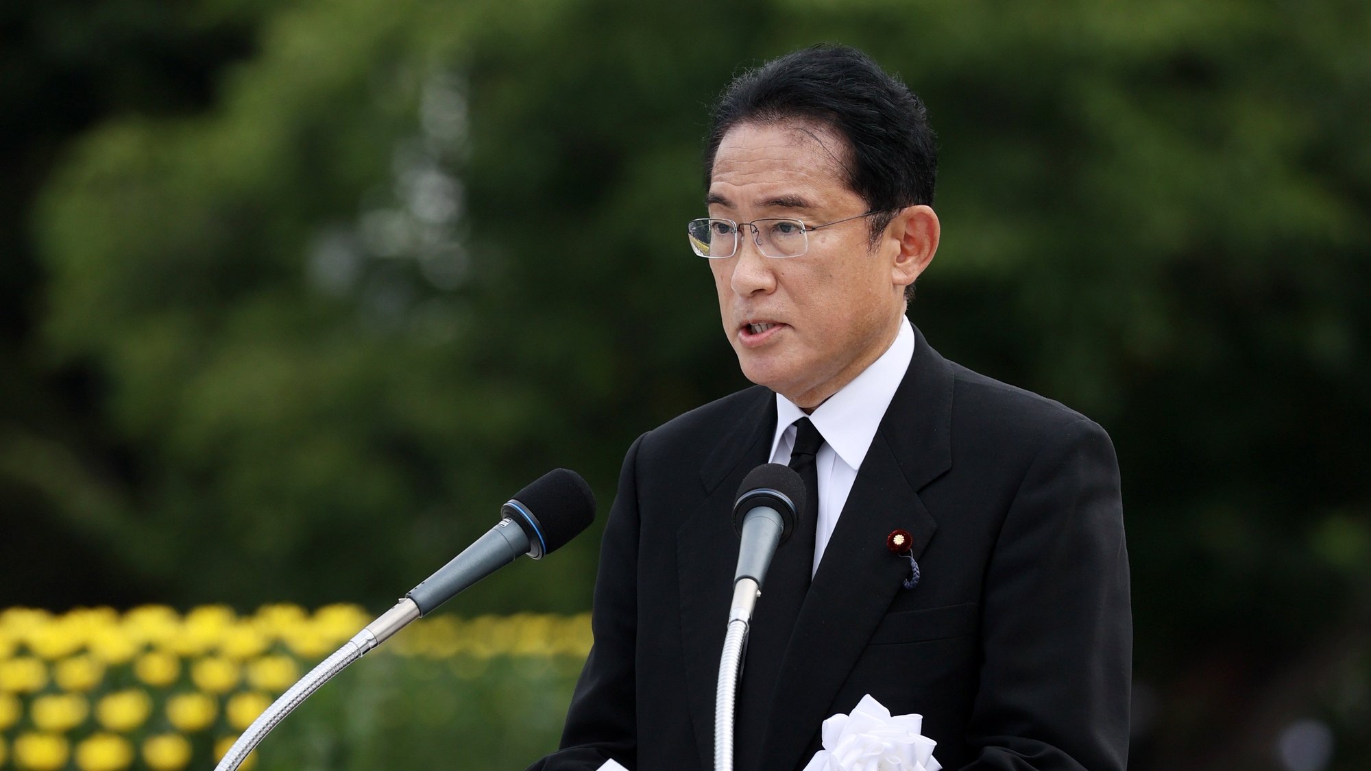 epa10108173 Japanese Prime Minister Fumio Kishida delivers a speech during a ceremony at Peace Memorial Park in Hiroshima, western Japan, 06 August 2022. On 06 August 2022, Japan marked the 77th anniversary of the bombing of Hiroshima.  EPA/JIJI PRESS JAPAN OUT EDITORIAL USE ONLY/
