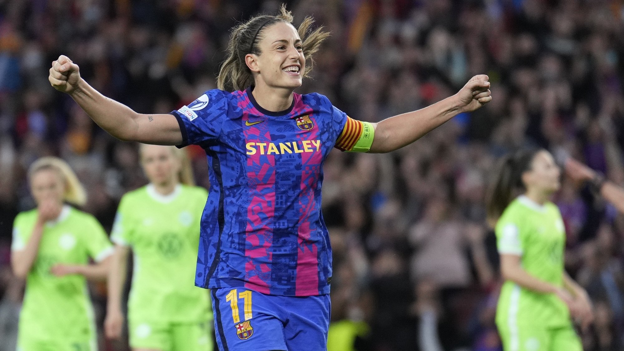 epa09903158 Barcelona&#039;s Alexia Putellas celebrates with teammates after scoring the 5-1 goal during the UEFA Women Champions League semi final first leg soccer match between FC Barcelona and Wolfsburg held at Camp Nou Stadium, in Barcelona, Spain, 22 April 2022.  EPA/Alejandro Garcia