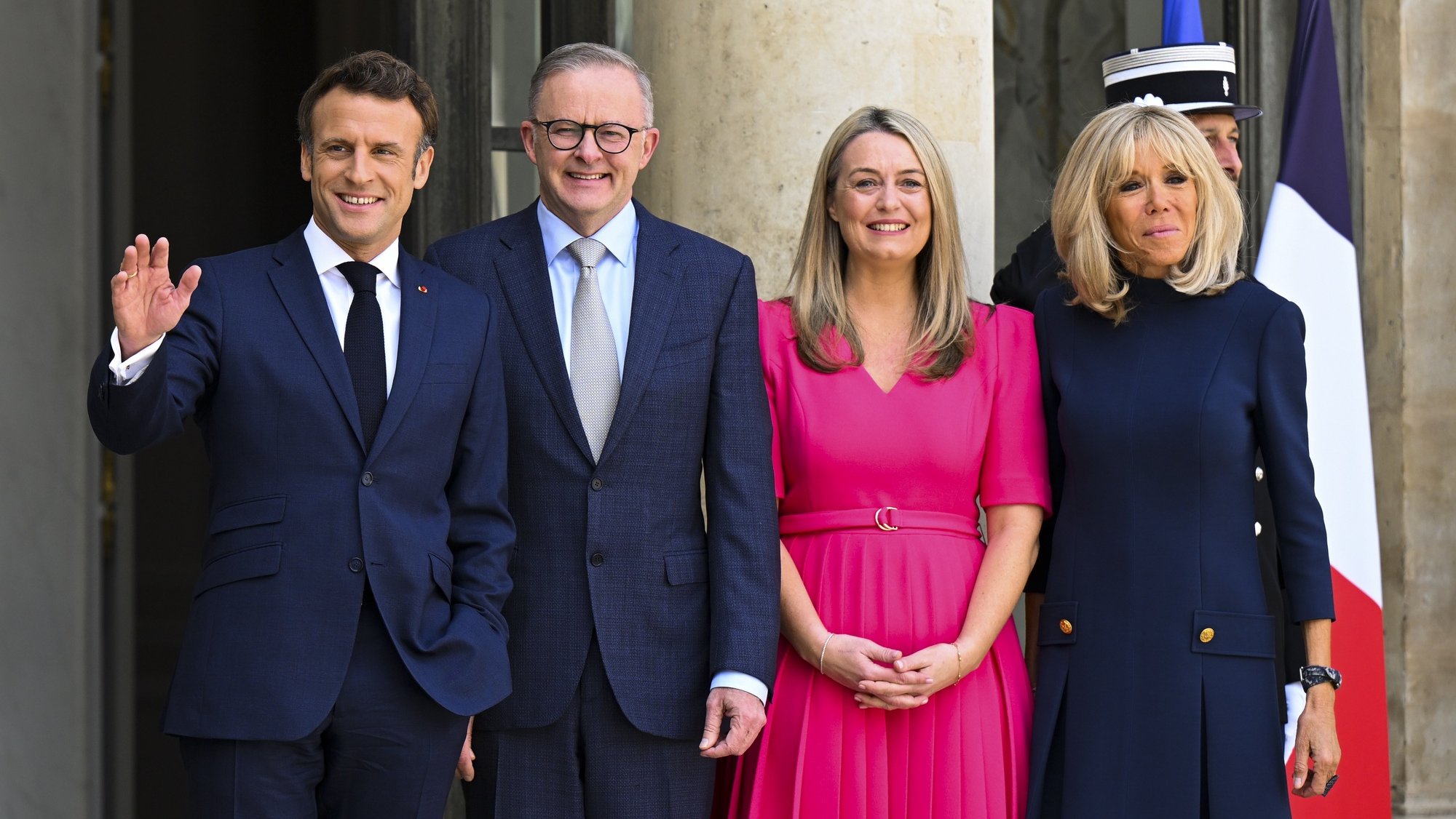 epa10045799 Australian Prime Minister Anthony Albanese is greeted by French President Emmanuel Macron along with their partners Jodie Haydon (2nd from right) and Brigitte Macron (right) at Elysee Palace in Paris, France, 01 July 2022. Mr Albanese is in France on a two-day official visit in a bid to repair the relationship with French President Emmanuel Macron.  EPA/LUKAS COCH AUSTRALIA AND NEW ZEALAND OUT