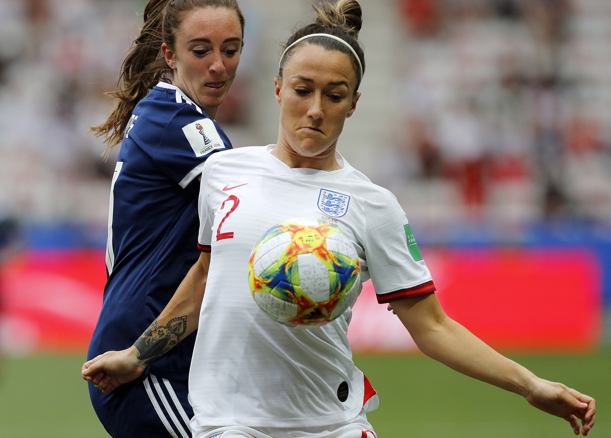 epa08890489 (FILE) - Lucy Bronze (R) of England in action against Lisa Evans (L) of Scotland during the preliminary round match between Scotland vs England at the FIFA Women&#039;s World Cup 2019 in Nice, France, 09 June 2019 (reissued 17 December 2020). Manchester City player Lucy Bronze wins Best FIFA Women&#039;s Player Award during the Best FIFA Football Awards virtual TV show broadcast from the FIFA headquarters in Zurich on 17 December 2020.  EPA/SEBASTIEN NOGIER *** Local Caption *** 55261140
