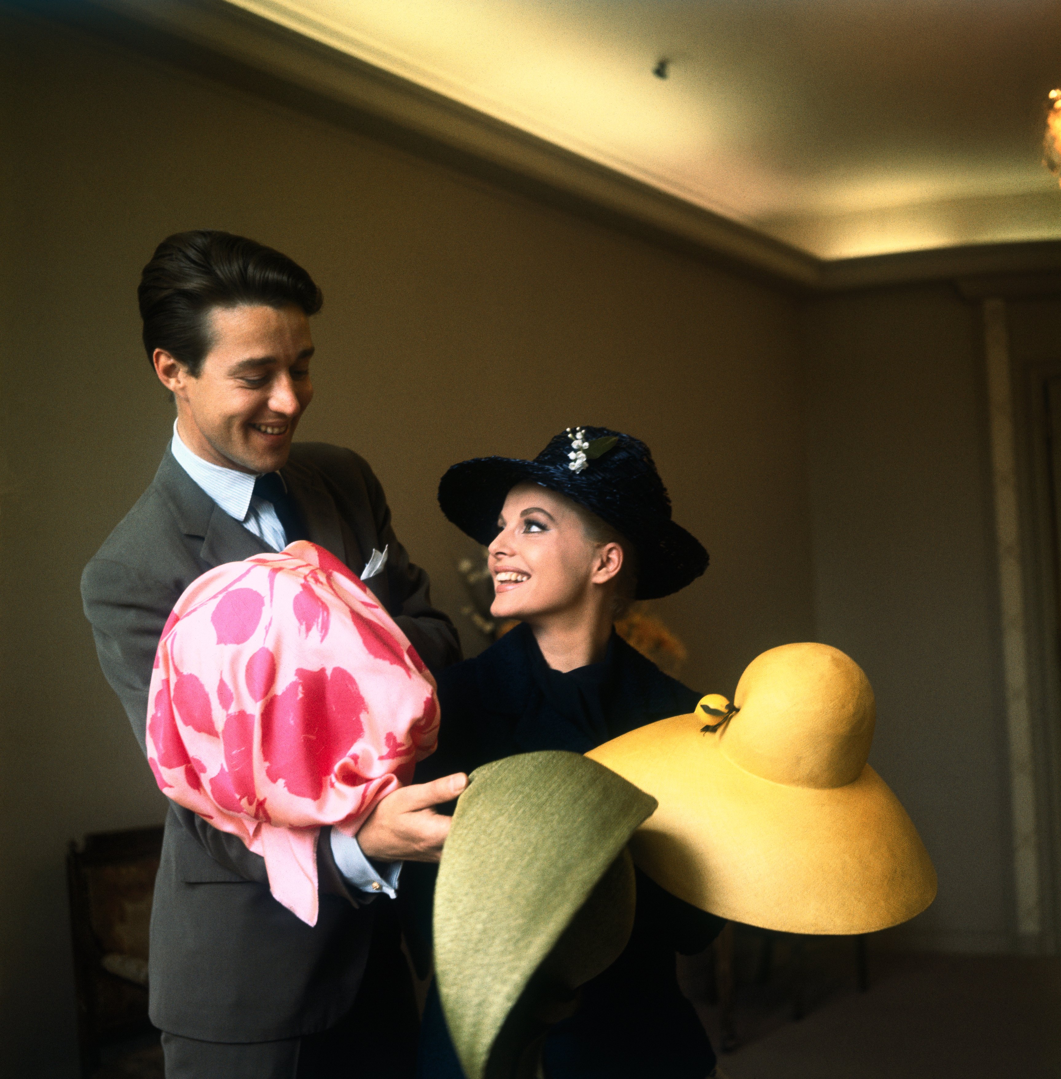 Virna Lisi Trying on Hats