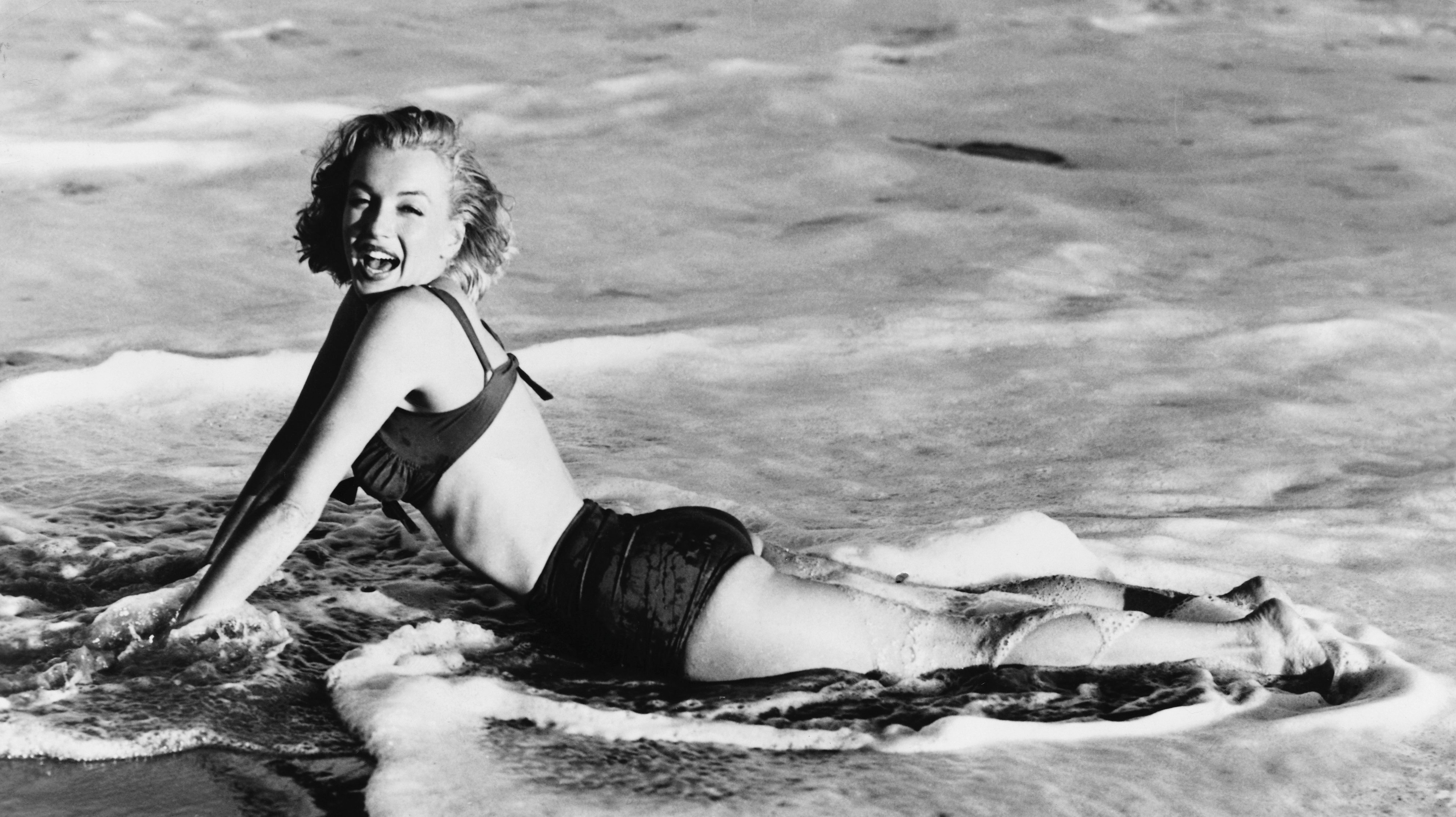 Marilyn Monroe Lying in Surf