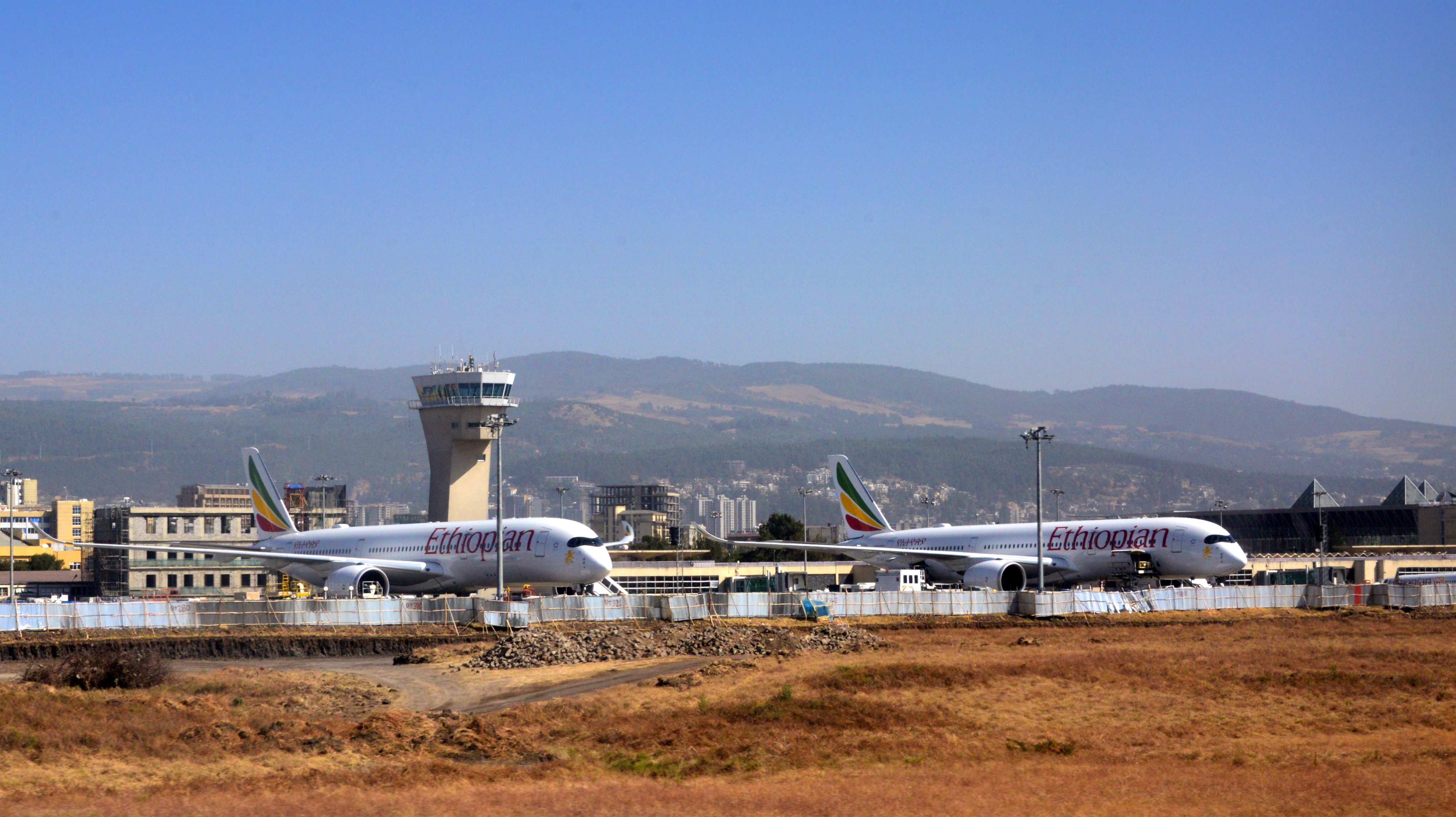 Addis Ababa Bole International Airport - control tower, Terminal 2 and Ethiopian Airlines Airbus A350 aircraft, Ethiopia