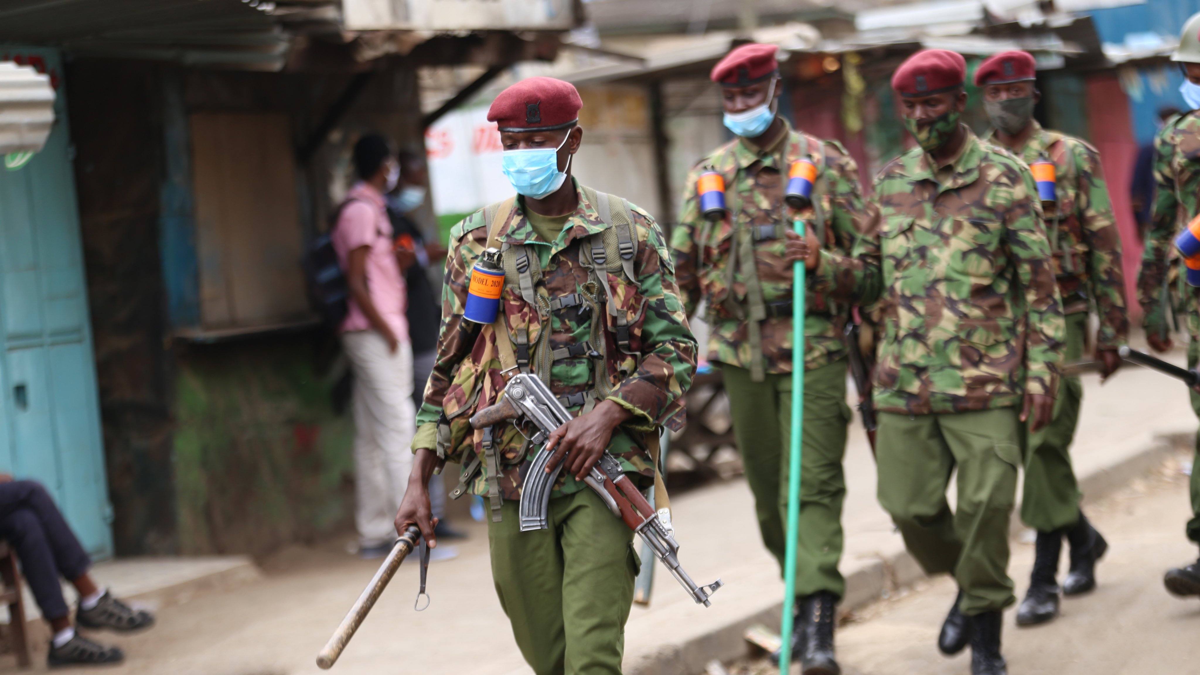 Police officers patrol the streets of Eastleigh during the