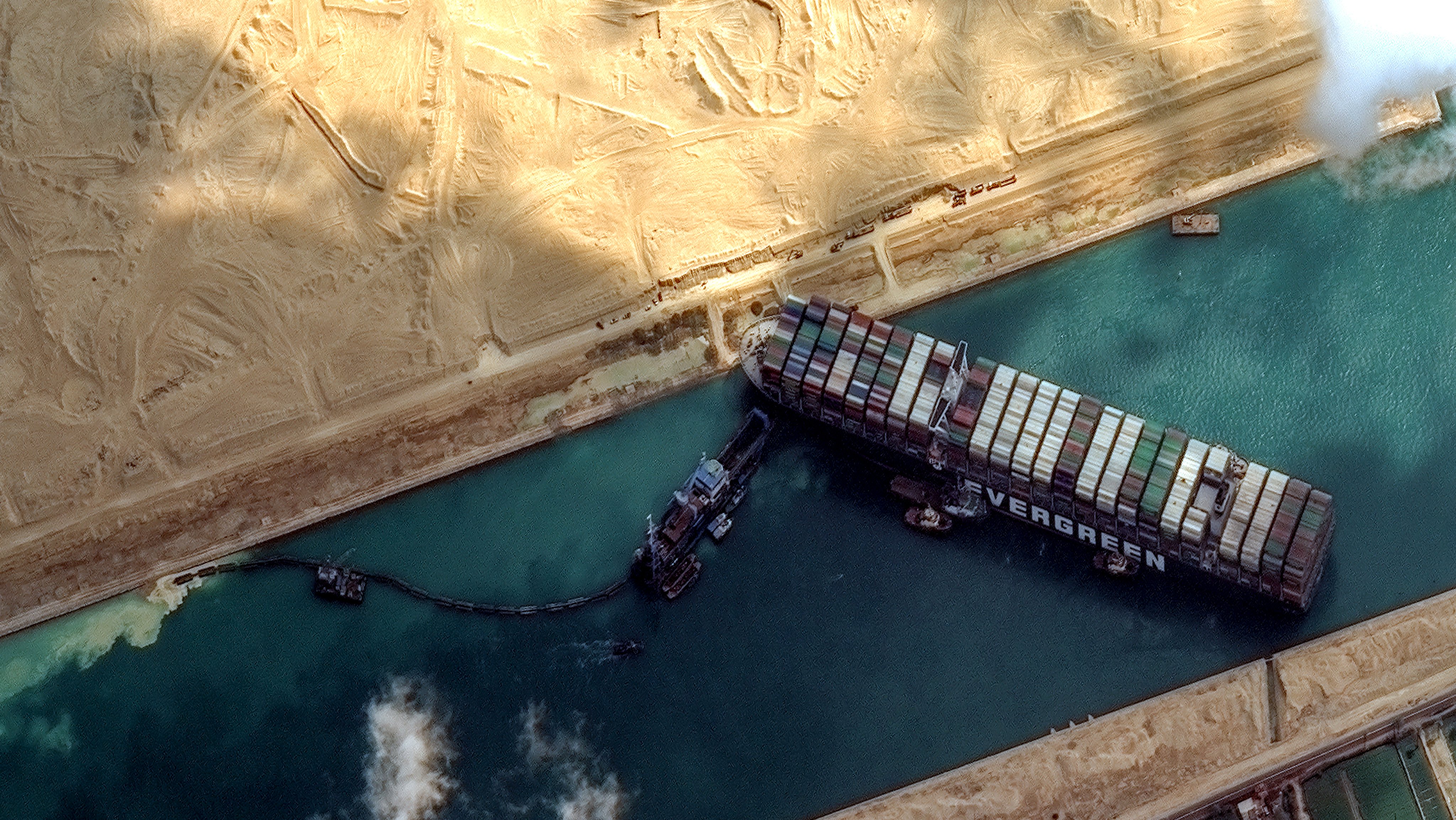 STUCK SHIP EVER GIVEN, SUEZ CANAL -- MARCH 26, 2021:  Maxars WorldView-2 collected new high-resolution satellite imagery of the Suez canal and the container ship (EVER GIVEN) that remains stuck in the canal north of the city of Suez, Egypt.