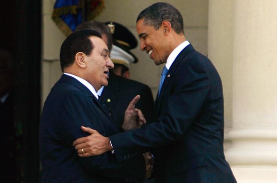 Egyptian President Hosni Mubarak (L) greets his US counterpart Barack Obama at the presidential palace in Cairo on June 4, 2009. Obama is in Egypt to make a much-heralded address to the world's 1.5 billion Muslims, seeking to heal a wide rift between America and Islam. AFP PHOTO/KHALED DESOUKI (Photo credit should read KHALED DESOUKI/AFP/Getty Images)