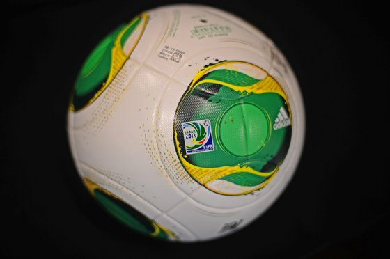 The official ball of the Fifa 2013 Confederation Cup called "Cafusa" is seen in Sao Paulo on December 1st, 2014 during the draw for next June's eight-nation Confederations Cup which is a dress rehearsal for the 2014 World Cup football.      AFP PHOTO / CHRISTOPHE SIMON        (Photo credit should read CHRISTOPHE SIMON/AFP/Getty Images)