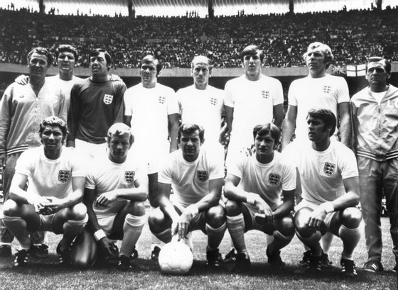 1970:  The England football team. Back row, from left: Shepherdson, B Labone, Gordon Banks, T Cooper, Bobby Charlton, Martin Peters, Bobby Moore (1941 - 1993) and L Cocker.  Front row, from left: Alan Ball, F Lee, A Mullery, T Wright and Geoff Hurst.  (Photo by Keystone/Getty Images)