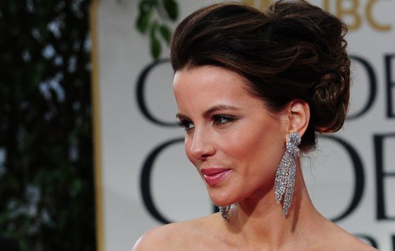 Actress Kate Beckinsale poses on the red carpet for the 69th annual Golden Globe Awards at the Beverly Hilton Hotel in Beverly Hills, California, January 15, 2012. AFP PHOTO / Frederic J. BROWN (Photo credit should read FREDERIC J. BROWN/AFP/Getty Images)