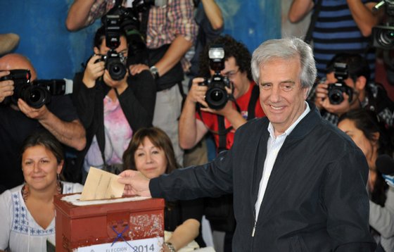 The presidential candidate of the Frente Amplio (Broad Front) party, former president (2005-2010) Tabare Vazquez, casts his vote at a polling station in Montevideo, on October 26, 2014. Polls opened in Uruguay Sunday to elect a successor to folksy iconoclast President Jose Mujica, who remains popular but cannot stand for re-election under term limits. Polling began at 8:00 am (1000 GMT) with Mujica looking to hand power back to his predecessor, cancer doctor Tabare Vazquez of the Broad Front, who needs 50 percent plus one vote to avoid a runoff with Luis Lacalle Pou of the National Party or Pedro Bordaberry, the son of a former dictator who is running on the Colorado ticket.  AFP PHOTO/Guillermo LEGARIA        (Photo credit should read GUILLERMO LEGARIA/AFP/Getty Images)