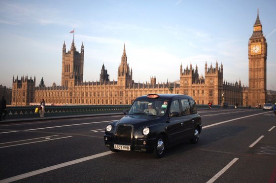 LONDON, ENGLAND - MARCH 28: A black taxi cab makes its way over Westminster Bridge on March 28, 2012 in London, England. (Photo by Dan Kitwood/Getty Images)