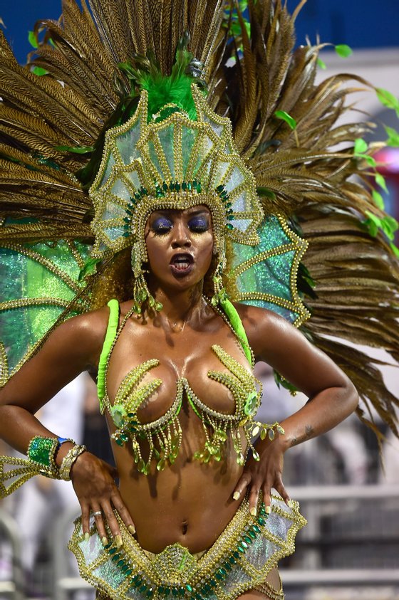 Revelers of the Nene de Vila Matilde samba school perform during the first night of carnival parade at the Anhembi Sambadrome in Sao Paulo, Brazil on February 13, 2015. AFP PHOTO / NELSON ALMEIDA        (Photo credit should read NELSON ALMEIDA/AFP/Getty Images)