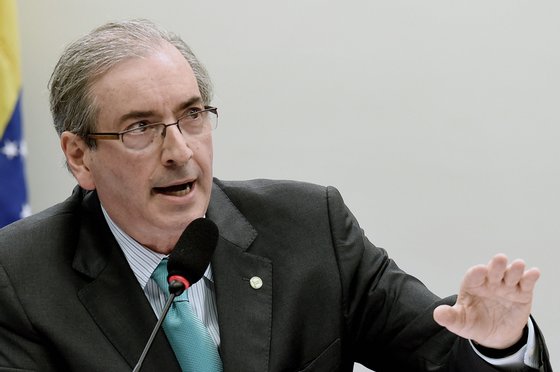 Chamber of Deputies President Eduardo Cunha of the Brazilian Democratic Movement Party (PMDB) speaks during a hearing with the Parliamentary Commission of Inquiry that investigates accusations of corruption in Petrobras, in Brasilia on March 12, 2015. Dozens of politicians from five parties, including from that of Brazilian President Dilma Rousseff, have been implicated in a corrupt network which laundered $4 billion of Brazil's state oil giant money. AFP PHOTO/EVARISTO SA        (Photo credit should read EVARISTO SA/AFP/Getty Images)