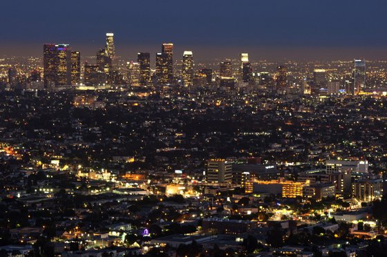 The Los Angeles skyline is seen during twilight on August 21, 2013 in California. AFP PHOTO /JOE KLAMAR (Photo credit should read JOE KLAMAR/AFP/Getty Images)