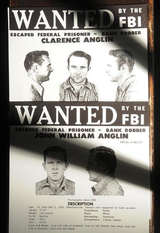 a-copy-of-john-and-clarence-anglin-s-wanted-poster-rests-outside-a-medical-cell-on-alcatraz-island