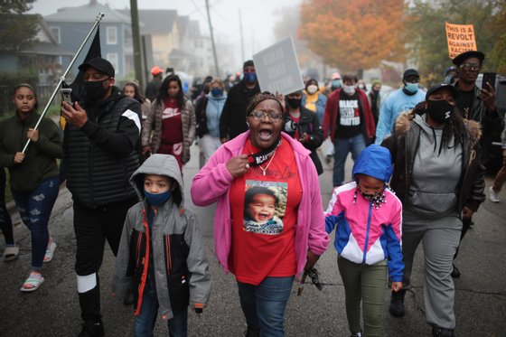 Protest March Held In Waukegan, Illinois After Police Shooting Kills Teen During Traffic Stop Tuesday Night