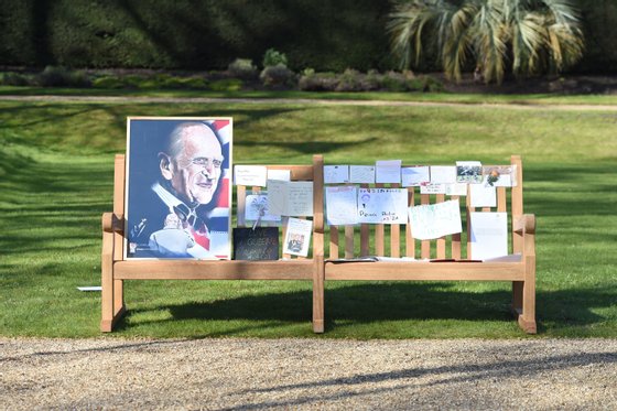 The Prince Of Wales And The Duchess Of Cornwall View Tributes Left By Members Of The Public Following The Death Of The Duke Of Edinburgh